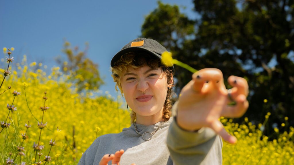 person offering flower